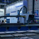 A view of advanced industrial machinery displayed at a trade fair exhibit.