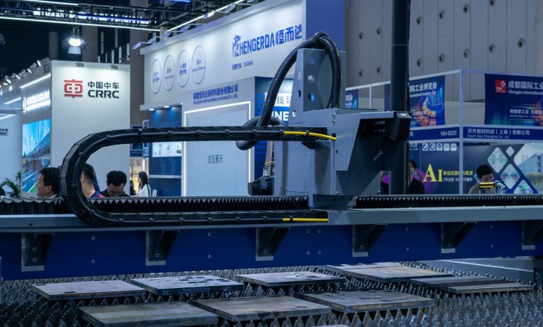 A view of advanced industrial machinery displayed at a trade fair exhibit.