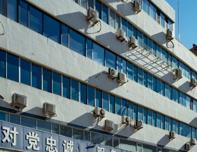 Exterior of urban building with air conditioners on the facade in Luoyang, China.