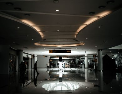 Sophisticated lobby with modern design and ambient lighting, featuring a spacious hallway.