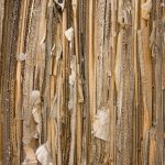 Detailed view of stacked recyclable cardboard showing texture and patterns.